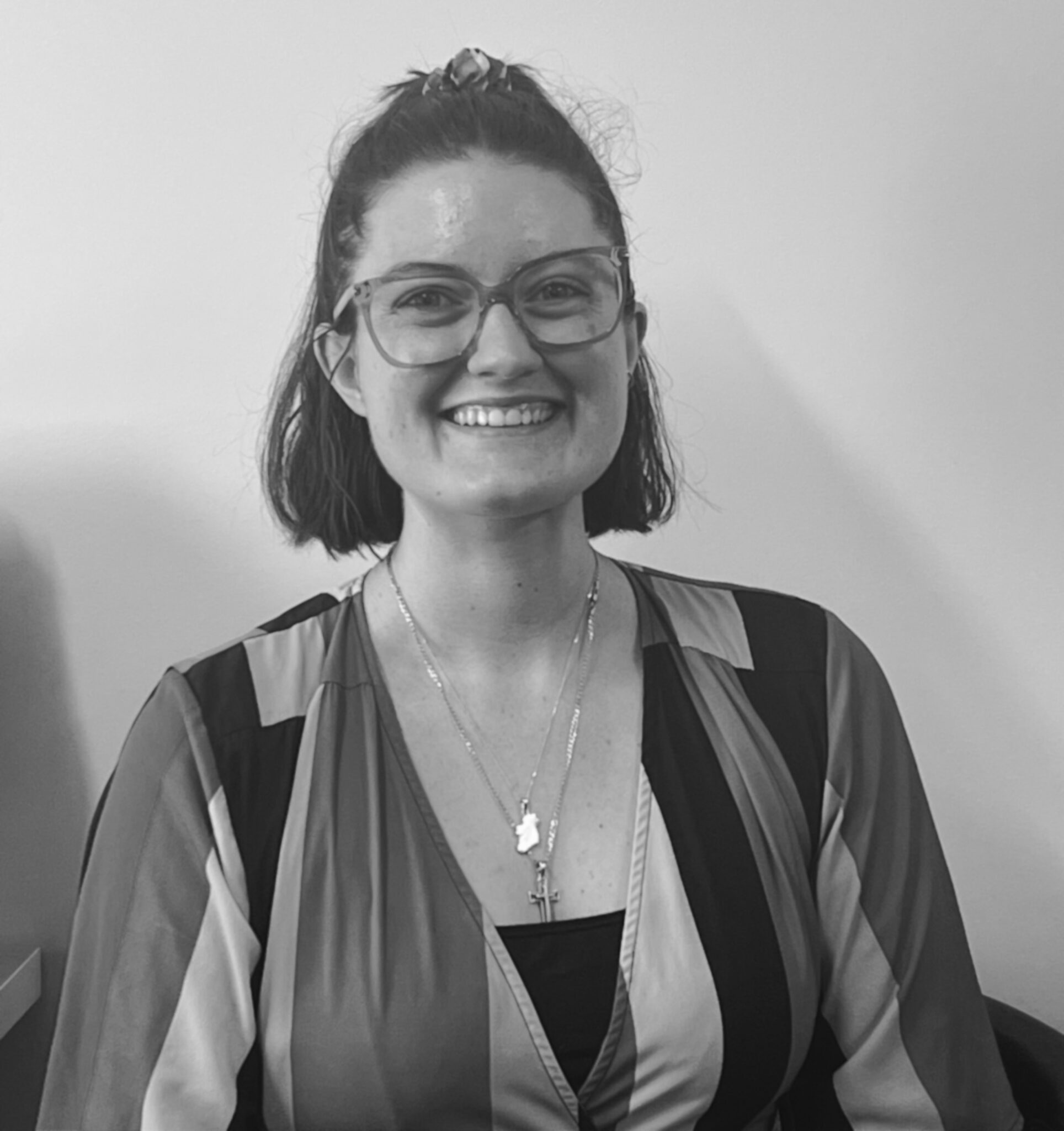 a woman smiling at camera